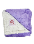 A folded plush throw blanket with a diagonal split of lavender purple and white sherpa-like fabric