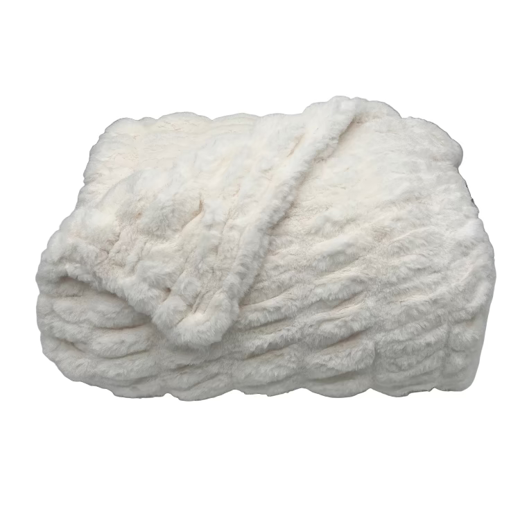 White textured blanket on a light gray background